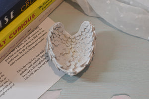 Tea light angel wing candle holder