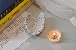 Tea light angel wing candle holder