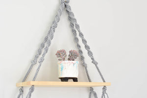 Macrame hanging plant holder with shelf