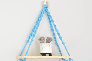 Macrame hanging plant holder with shelf